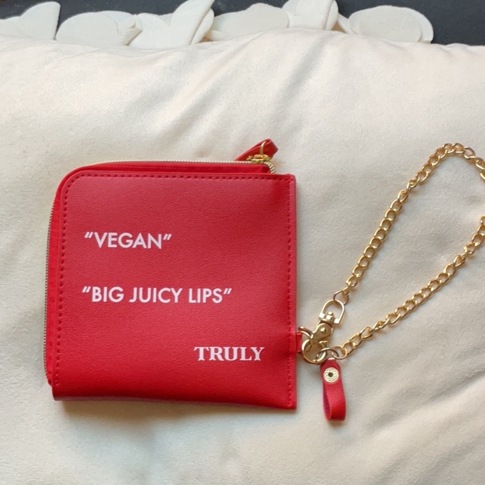 TRULY New Red Gloat Red Wristlet,adjustable gold chain and zips.Perfect interior